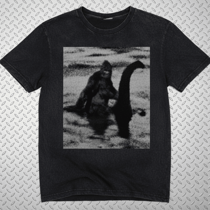T-Shirt - Bigfoot Riding Nessie Shirt | Unisex Heavy Vintage - Unisex Lane Seven | Bigfoot, Cryptids, Retro & Vintage, Funny from SHIRT MONSTERS