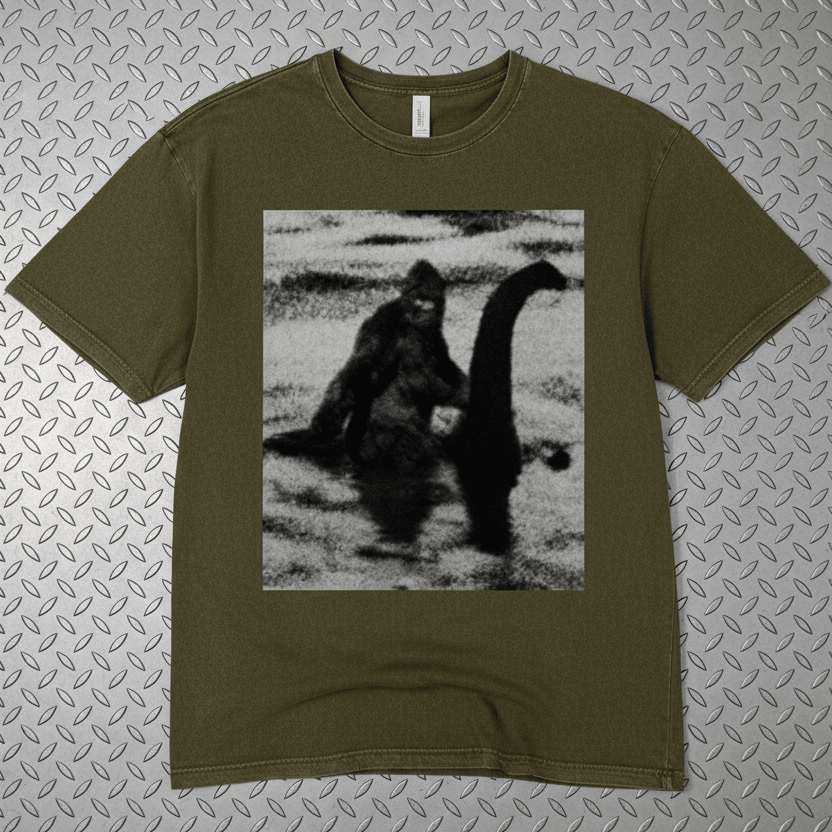 T-Shirt - Bigfoot Riding Nessie Shirt | Unisex Heavy Vintage - Unisex Lane Seven | Bigfoot, Cryptids, Retro & Vintage, Funny from SHIRT MONSTERS