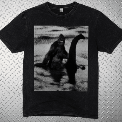 T-Shirt - Bigfoot Riding Nessie Shirt | Unisex Heavy Vintage - Unisex Lane Seven | Bigfoot, Cryptids, Retro & Vintage, Funny from SHIRT MONSTERS