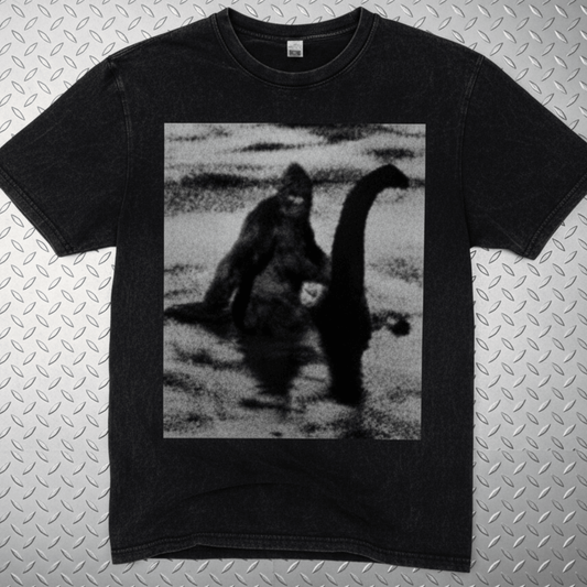 T-Shirt - Bigfoot Riding Nessie Shirt | Unisex Heavy Vintage - Unisex Lane Seven | Bigfoot, Cryptids, Retro & Vintage, Funny from SHIRT MONSTERS