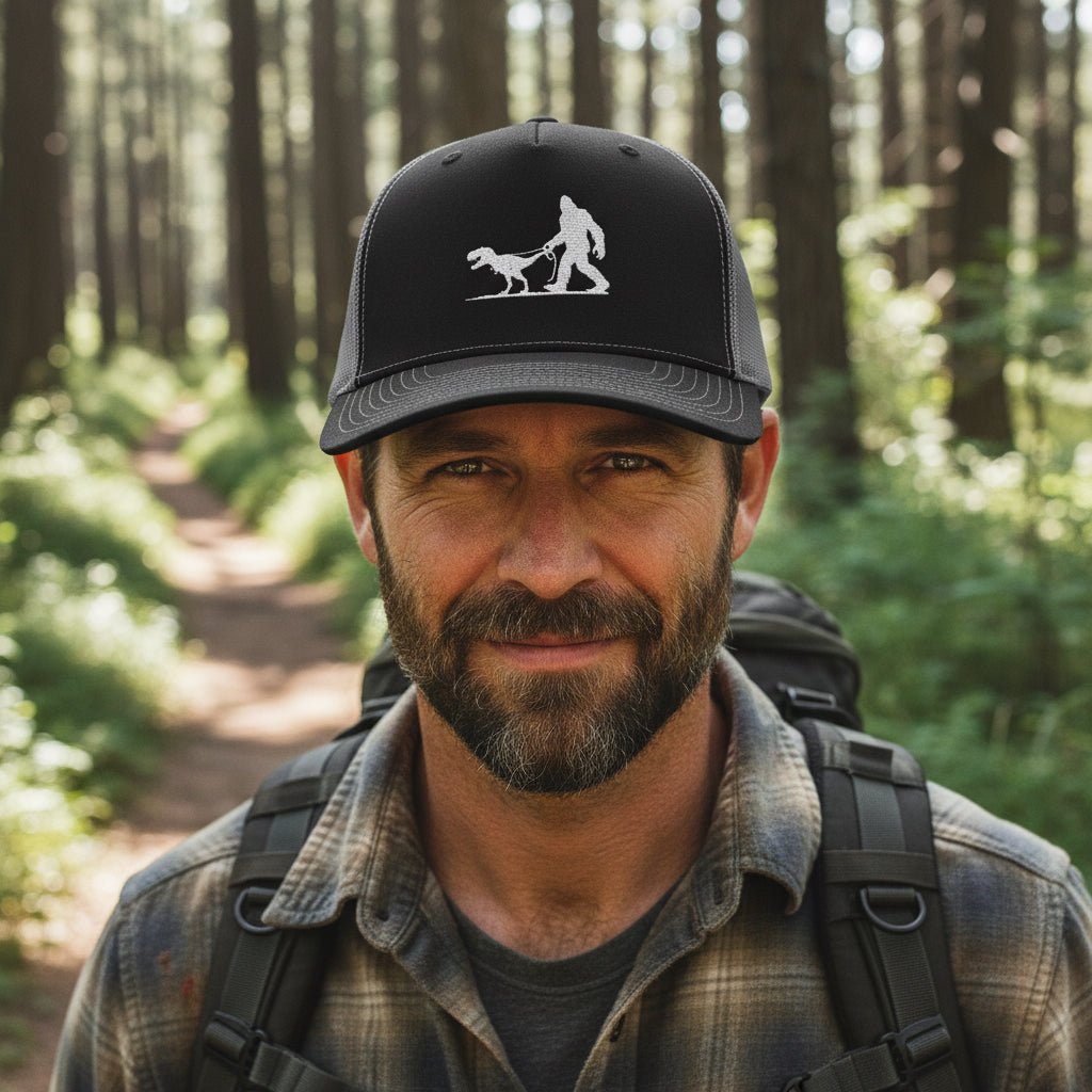Hats - Bigfoot Walking Dinosaur Hat | Trucker Cap | Cryptids, Funny from Crypto Zoo Tees