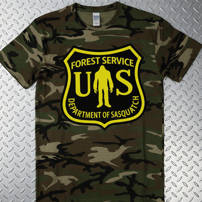 T-Shirt - Camo Bigfoot National Park Shirt | Unisex Port Authority Underground Threads Tee | Bigfoot, Retro & Vintage from SHIRT MONSTERS
