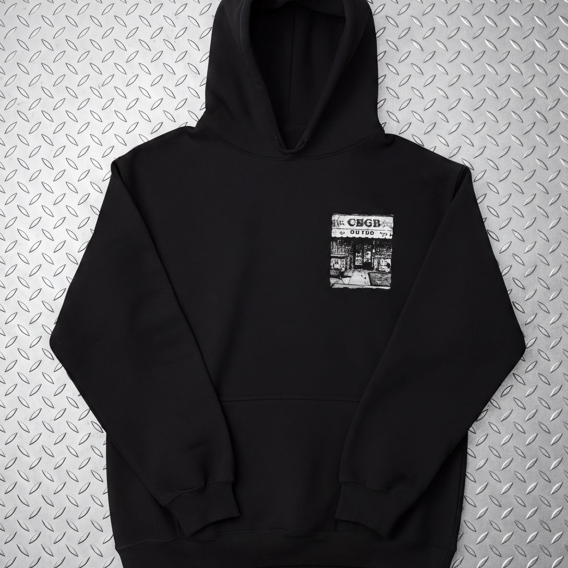 A black hoodie with a graphic design on the front pocket.