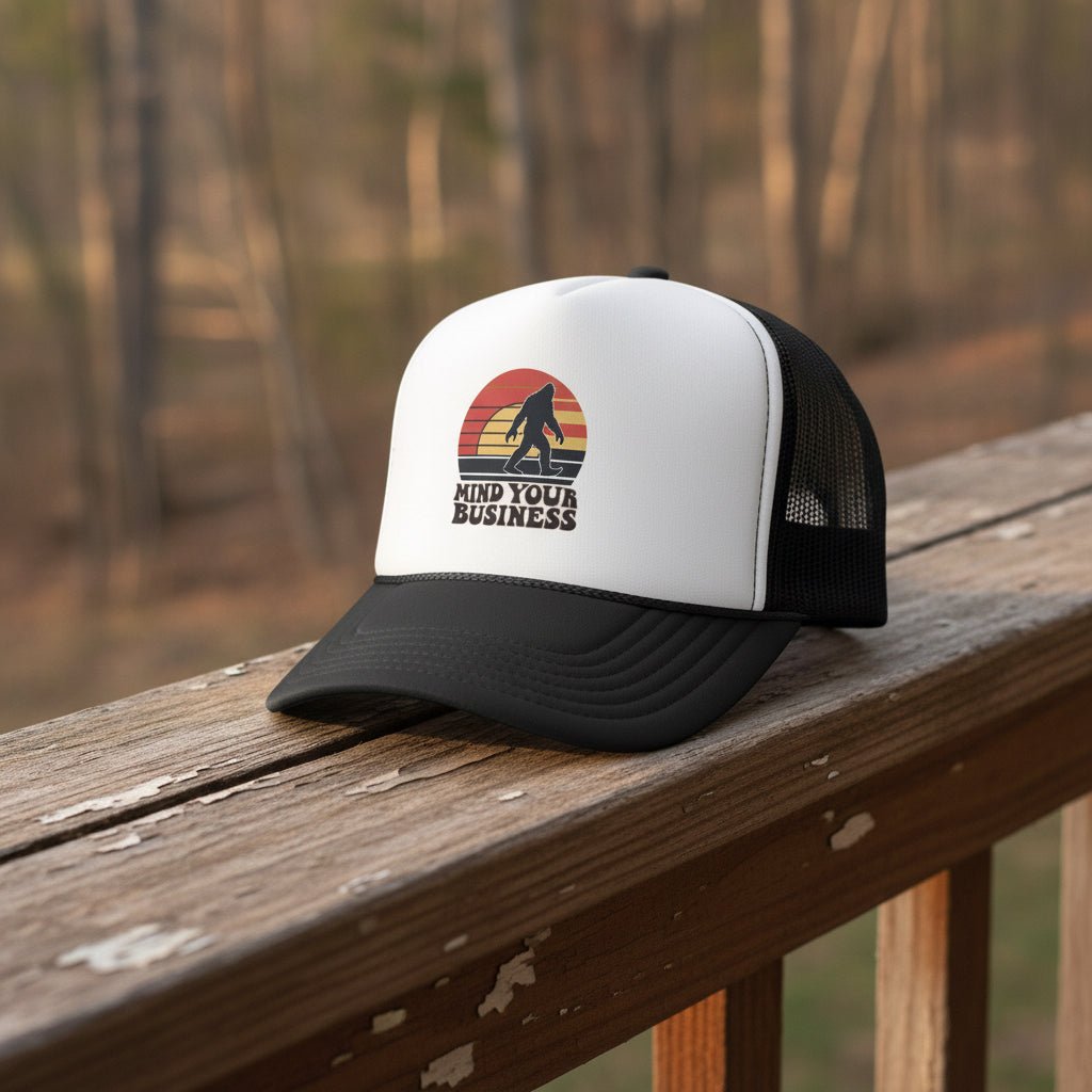 Hats - Mind Your Business Bigfoot Hat | Trucker Cap | Bigfoot, Funny from Crypto Zoo Tees