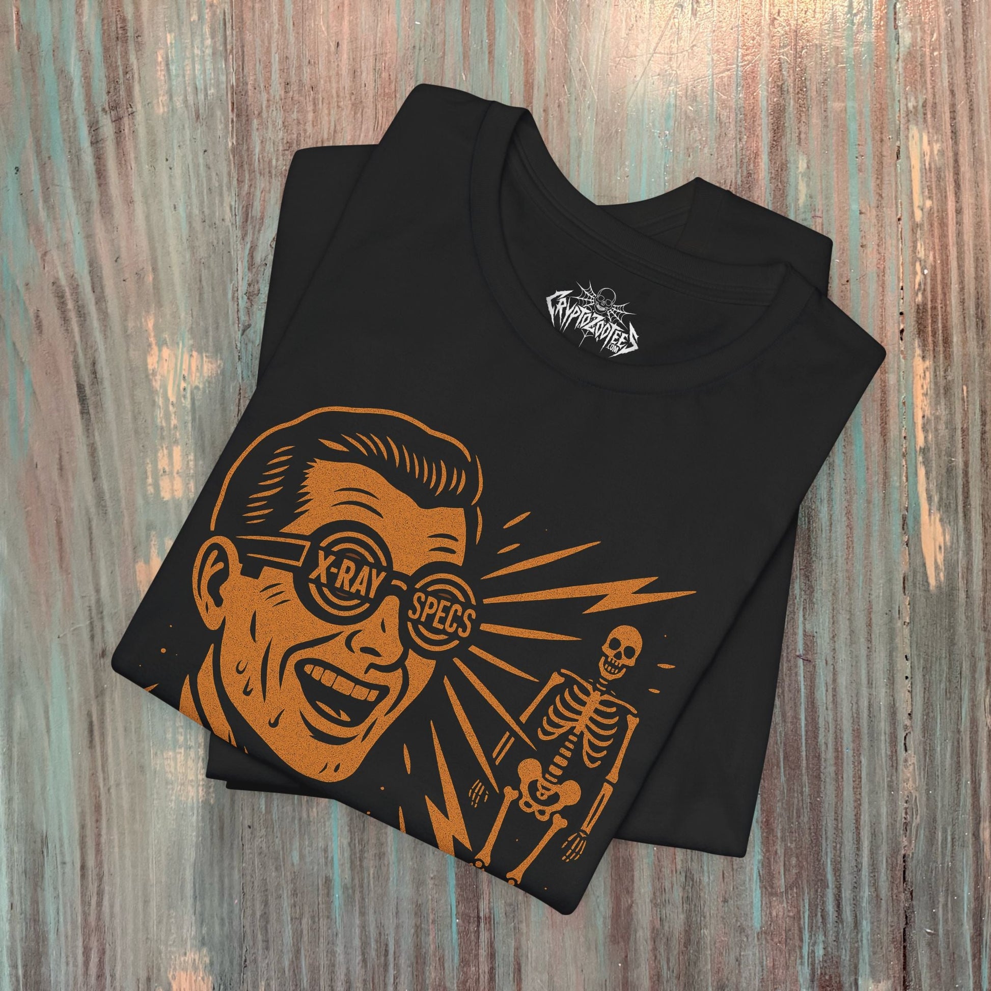 T-Shirt - X - Ray Specs Ad | Unisex T-shirt (Bella+Canvas 3001) | Funny, Retro &amp; Vintage from Crypto Zoo Tees